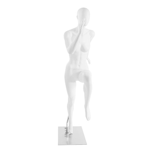 A white Econoco female sprinter mannequin with a metal pole.