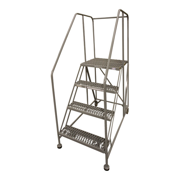 A gray Cotterman steel rolling work platform with four steps and wheels.