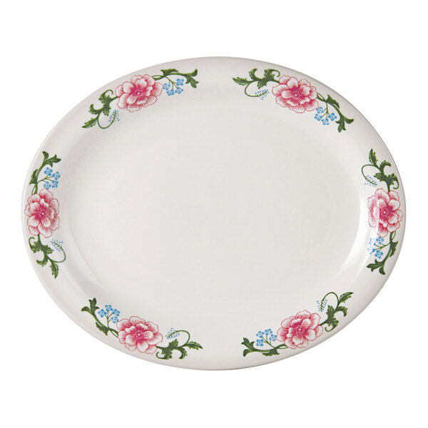 A Tuxton white china oval platter with a pink floral pattern.