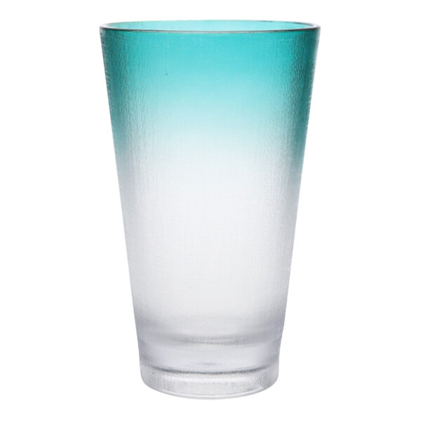 A Fortessa La Cote highball glass with a blue and white gradient.