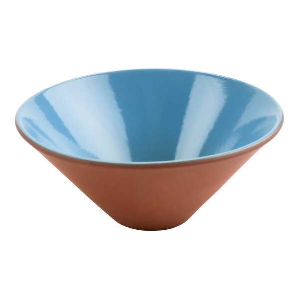 A close up of a blue and brown Cheforward by GET Graupera terracotta bowl.