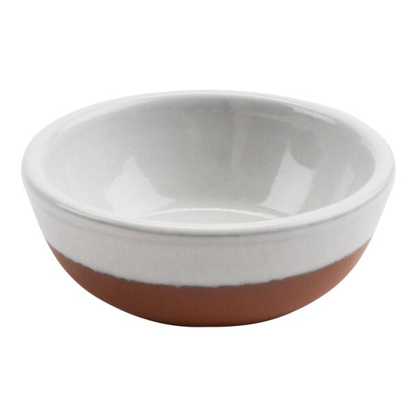A white terracotta bowl with a brown rim.