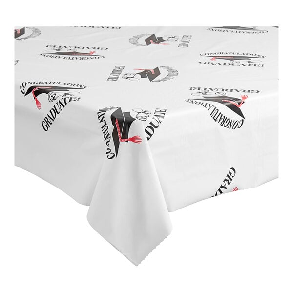A white Table Mate plastic table cover roll with black and red graduation designs.