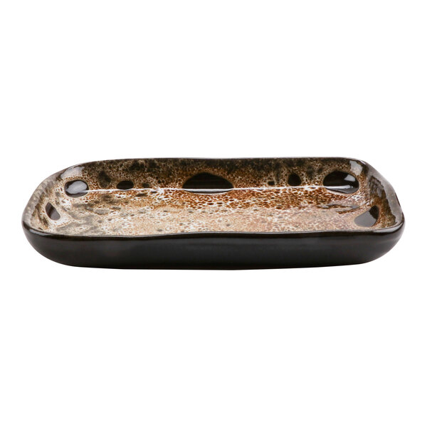 A rectangular cheforward terracotta tray with a speckled brown surface.