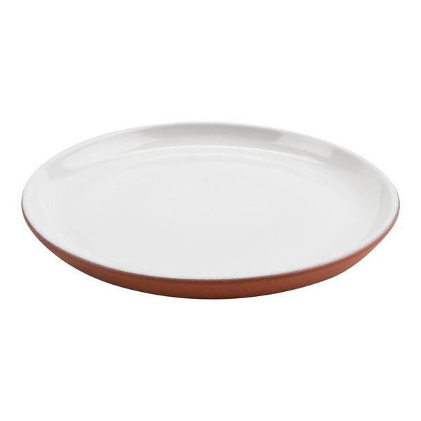 A white terracotta deep plate with a brown rim.