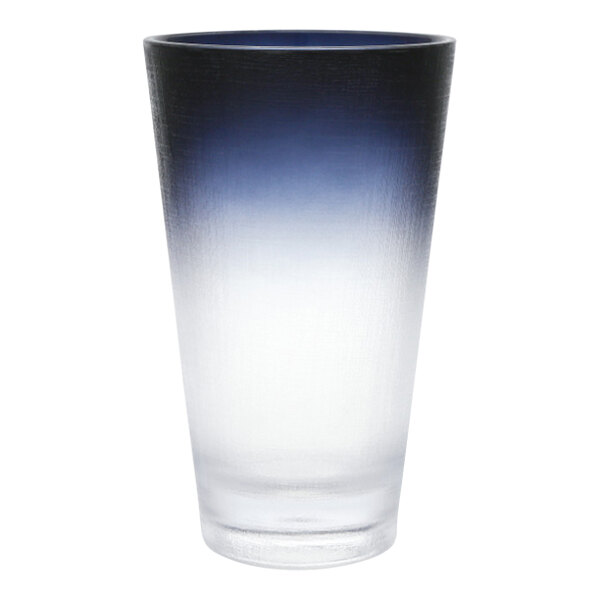 A close-up of a Fortessa La Cote Mistral Gray Tritan plastic highball glass with a blue and white gradient.