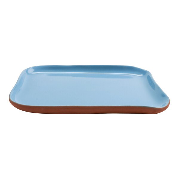 A blue and brown rectangular terracotta tray with a cheforward logo on the surface.