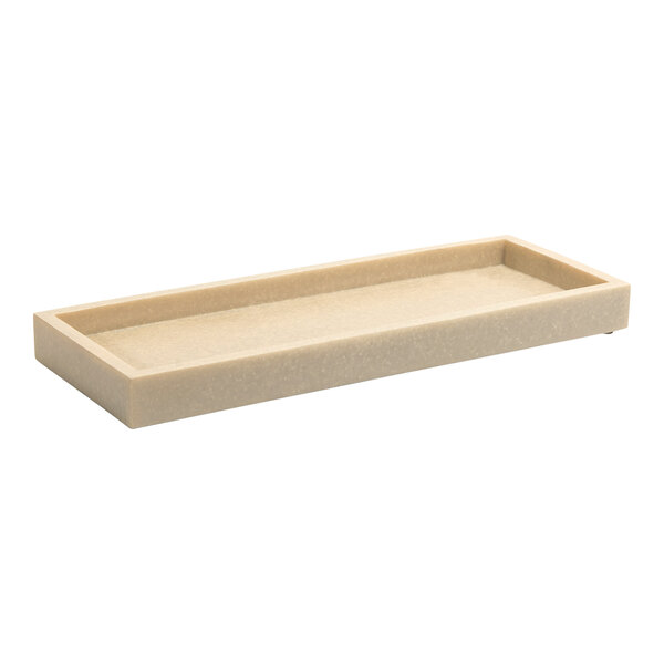 A rectangular stone amenity tray with a white surface and black base.