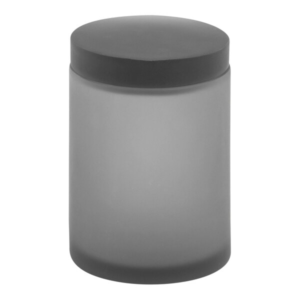 A grey glass Room360 Nassau storage jar with a black lid.