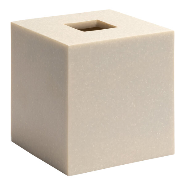 A white stone square tissue box cover with a hole in it.