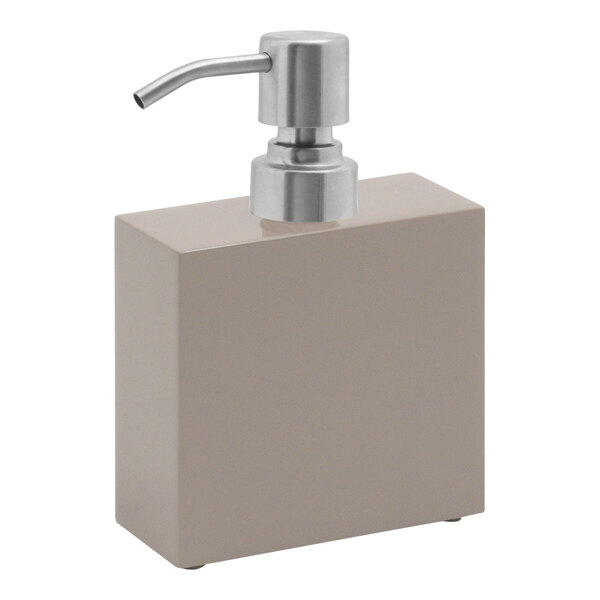 A square stone soap dispenser with a metal pump top.