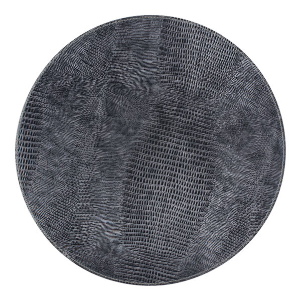 A Room360 graphite reusable round placemat with a gray pattern on a round black surface.