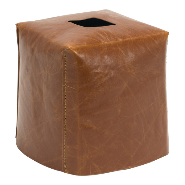 A brown leather Room360 Austin tissue box cover with a square hole in the top.