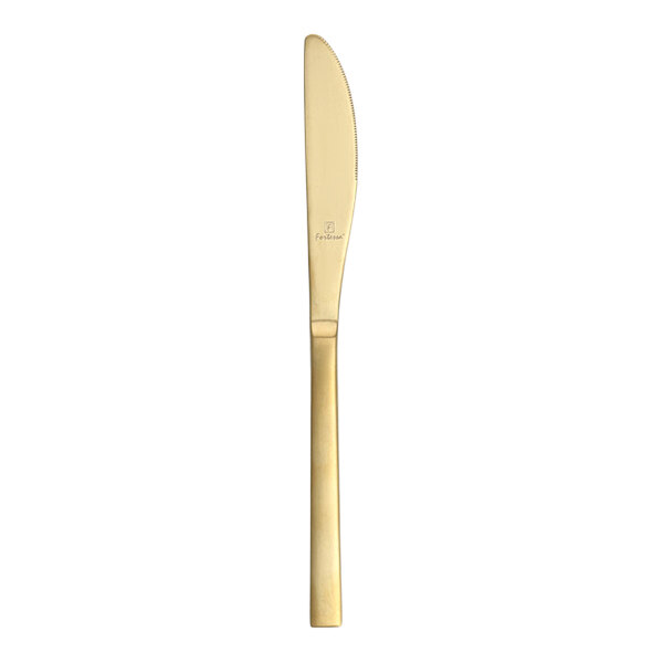 A close up of a Fortessa Arezzo stainless steel table knife with a brushed gold handle.