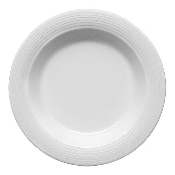 A Bauscher bright white porcelain plate with an embossed rim.