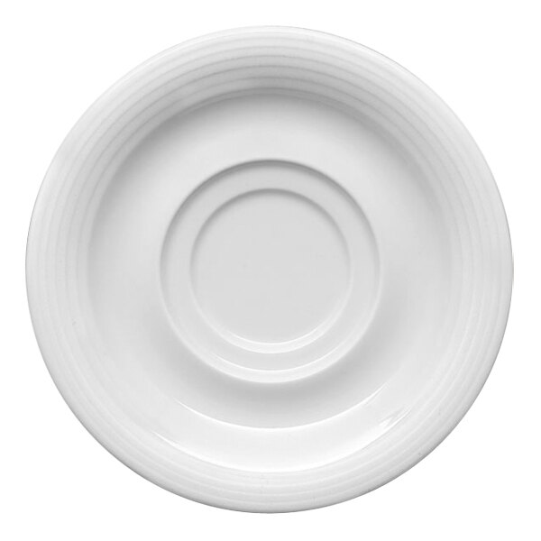 A Bauscher bright white porcelain saucer with a circular pattern on the rim.