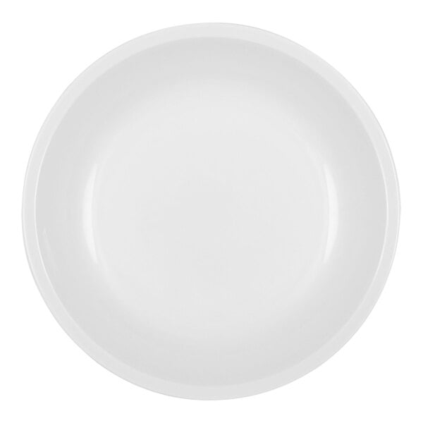 A close up of a white Bauscher Modulus porcelain coupe plate.