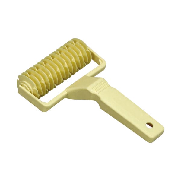 A yellow plastic roller with a handle.