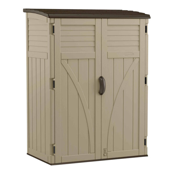 A tan Suncast vertical storage shed with white paneled doors and black handles.