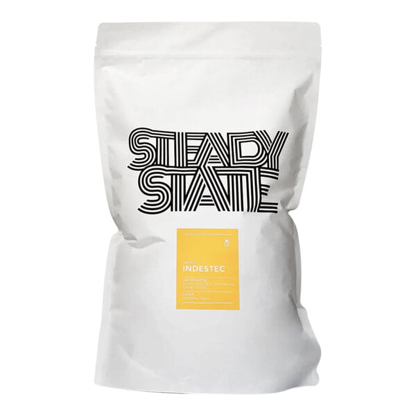 A white bag of Steady State Roasting coffee beans with black and white text.