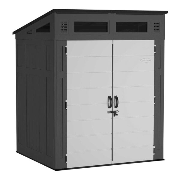 A grey storage shed with white double doors.