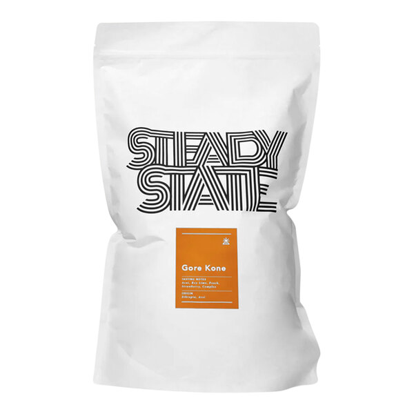 A white bag of Steady State Roasting Whole Bean Coffee with black text and a black and white logo.