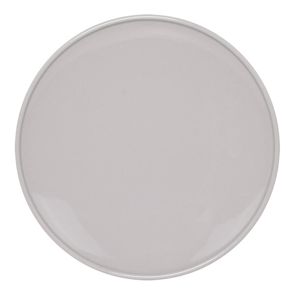 A Front of the House white porcelain plate with a round white border.