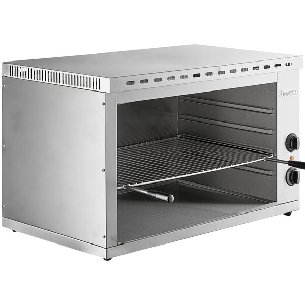 An Avantco stainless steel rectangular countertop cheese melter with a shelf.