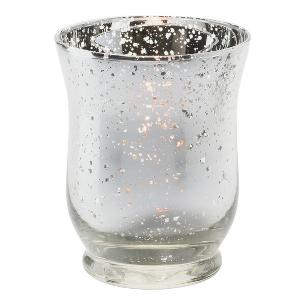 A speckled silver glass Hollowick votive candle holder.