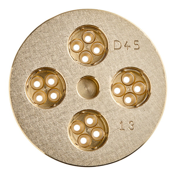 A circular brass Estella Bigoli pasta die with holes in it.