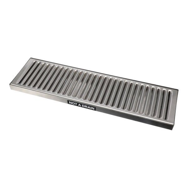A stainless steel Wilbur Curtis drain tray with a metal grate with holes.