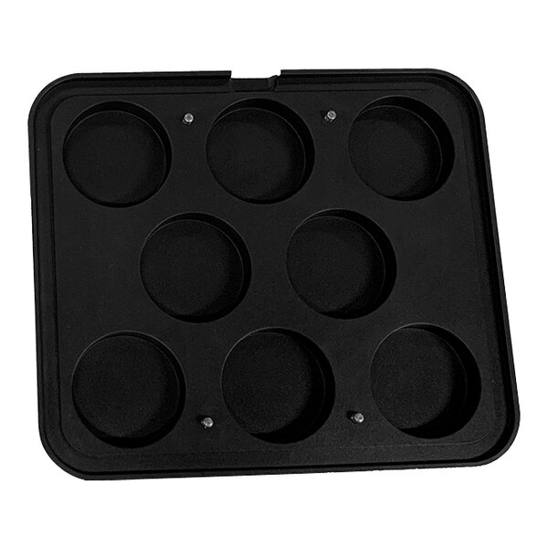 A black round Pavoni insert plate with 8 round cavities.