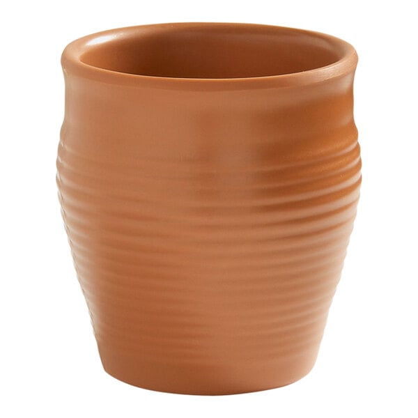 An American Metalcraft terracotta bowl with a curved design.