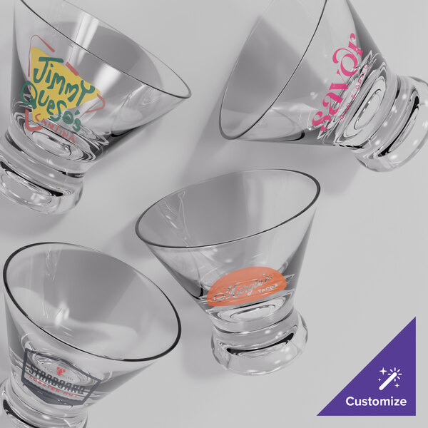 A set of four clear, customizable stemless martini glasses made from Tritan plastic.