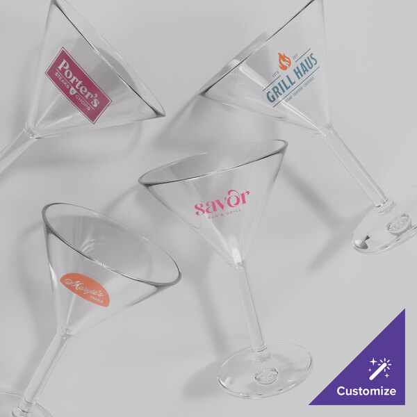 A set of clear plastic martini glasses with customizable logos on the bowls.