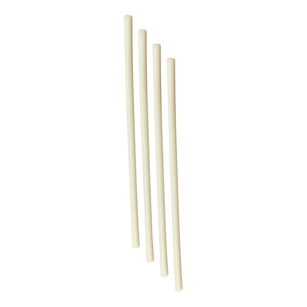 A group of unwrapped natural StrawFish cocktail stirrer straws.