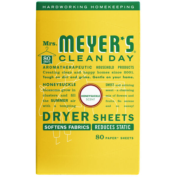 A yellow box of Mrs. Meyer's Clean Day Honeysuckle dryer sheets with white and green text.