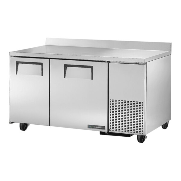 A stainless steel True worktop refrigerator with two doors.