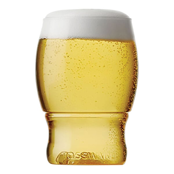 A close up of a Tossware plastic taster glass filled with beer and foam.