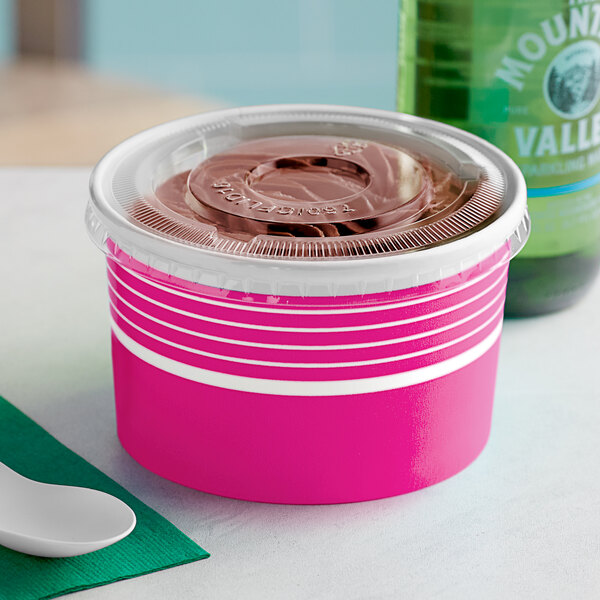 A pink Choice paper frozen yogurt container with a flat lid.