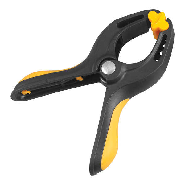 A black and yellow Olympia Tools plastic spring clamp with yellow tips.