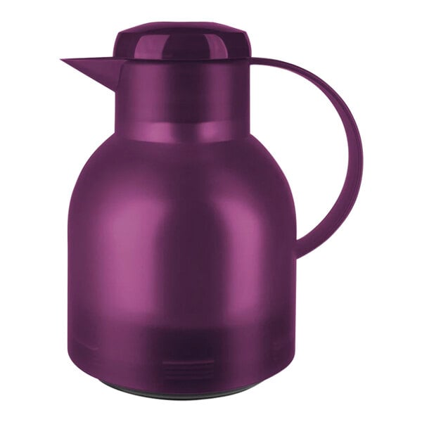 A transparent purple plastic carafe with a handle.