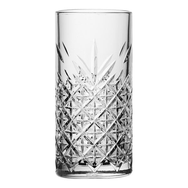 A close-up of a Pasabahce Timeless Vintage long drink glass with a diamond pattern.