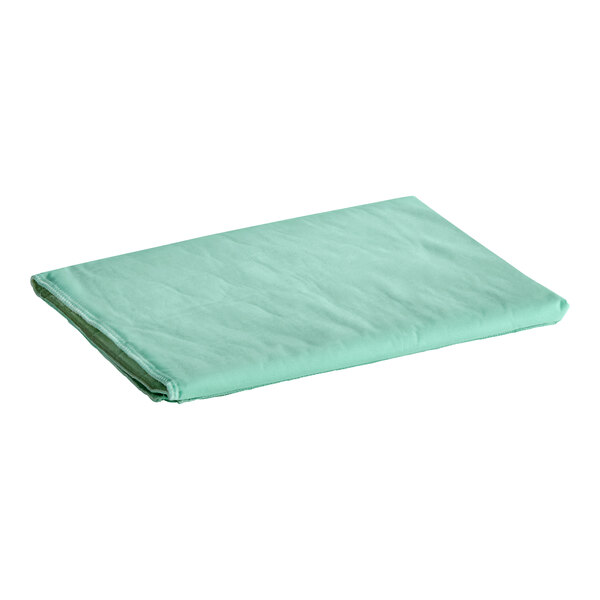 An Oxford green quilted mattress pad on a white background.
