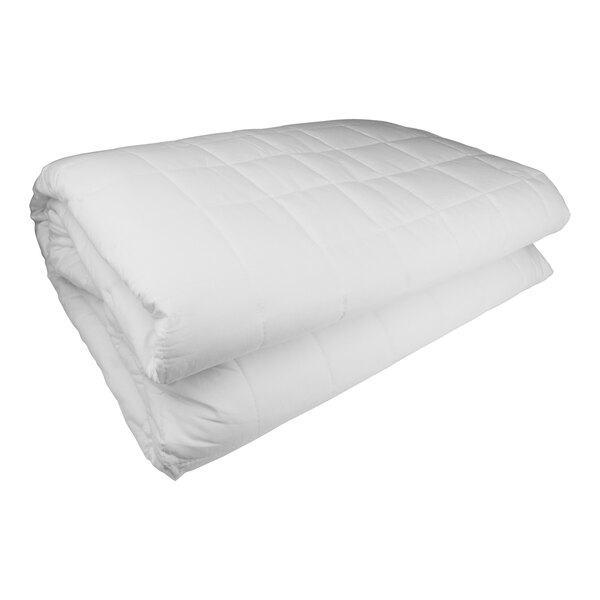 A folded white Oxford waterproof mattress pad on a white surface.