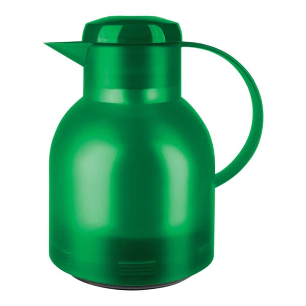 A transparent green plastic carafe with a handle.