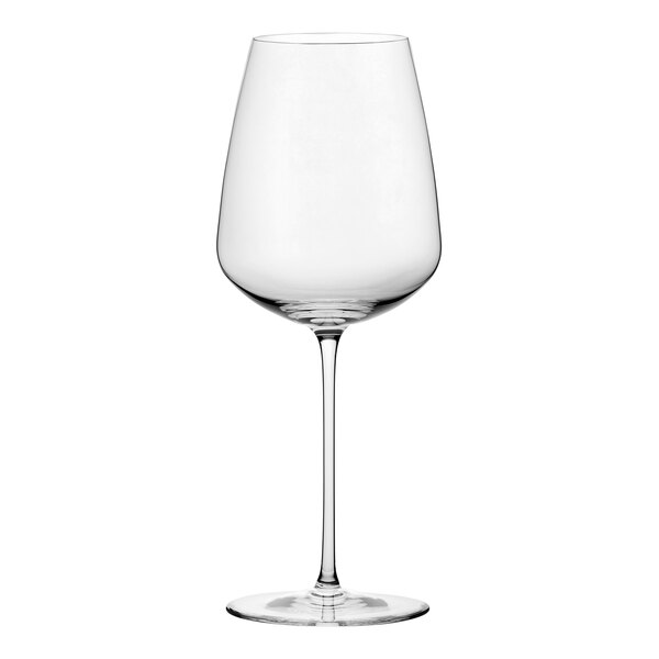 A close-up of a Nude Stem Zero Vertigo white wine glass with a stem.