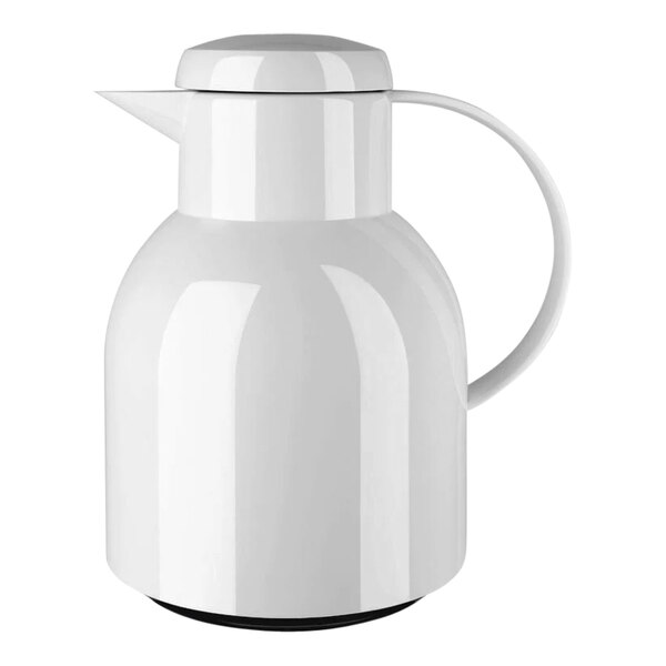 A white polypropylene vacuum insulated carafe with a handle.