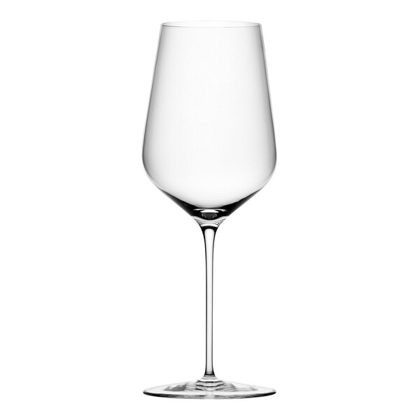 A close-up of a clear Nude Stem Zero white wine glass with a long stem.