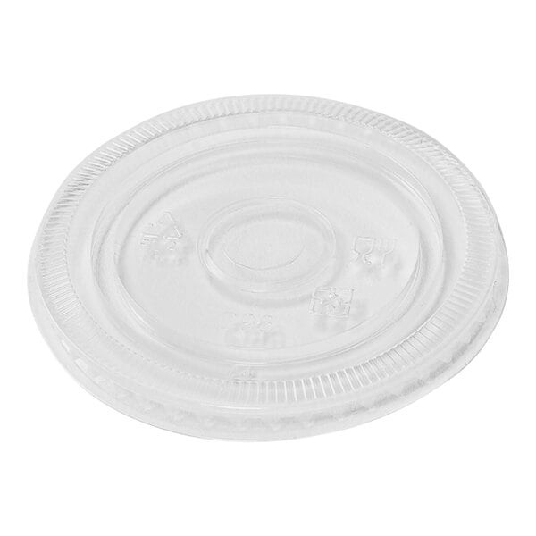 A clear plastic lid with a circle.